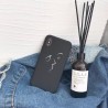 Coque silicone noir dessin visage double face iPhone X / XS