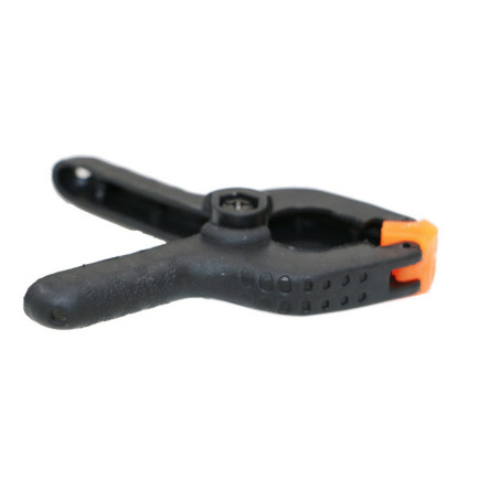 Petite pince a ressort en nylon pour collage